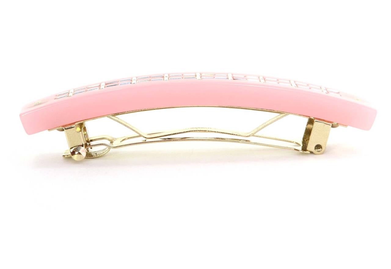 Chanel Pale Pink Resin & Rhinestone Hair Barrette
Features baguette rhinestones throughout with silvertone CC detailing
Made in: France
Year of Production: 2007
Stamp: 07 CC C
Closure: Hinge opening with a push spring clasp
Color: Pale pink