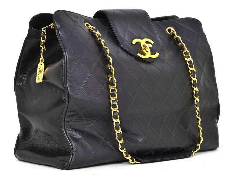 Chanel Black Vintage Quilted Leather XL Weekender W/GHW

Age: c. 1989-1991

Made in Italy

Materials: leather, goldtone metal

Roomy bag features zippered lefted compartment with two zippered pockets inside and additional open pockets on