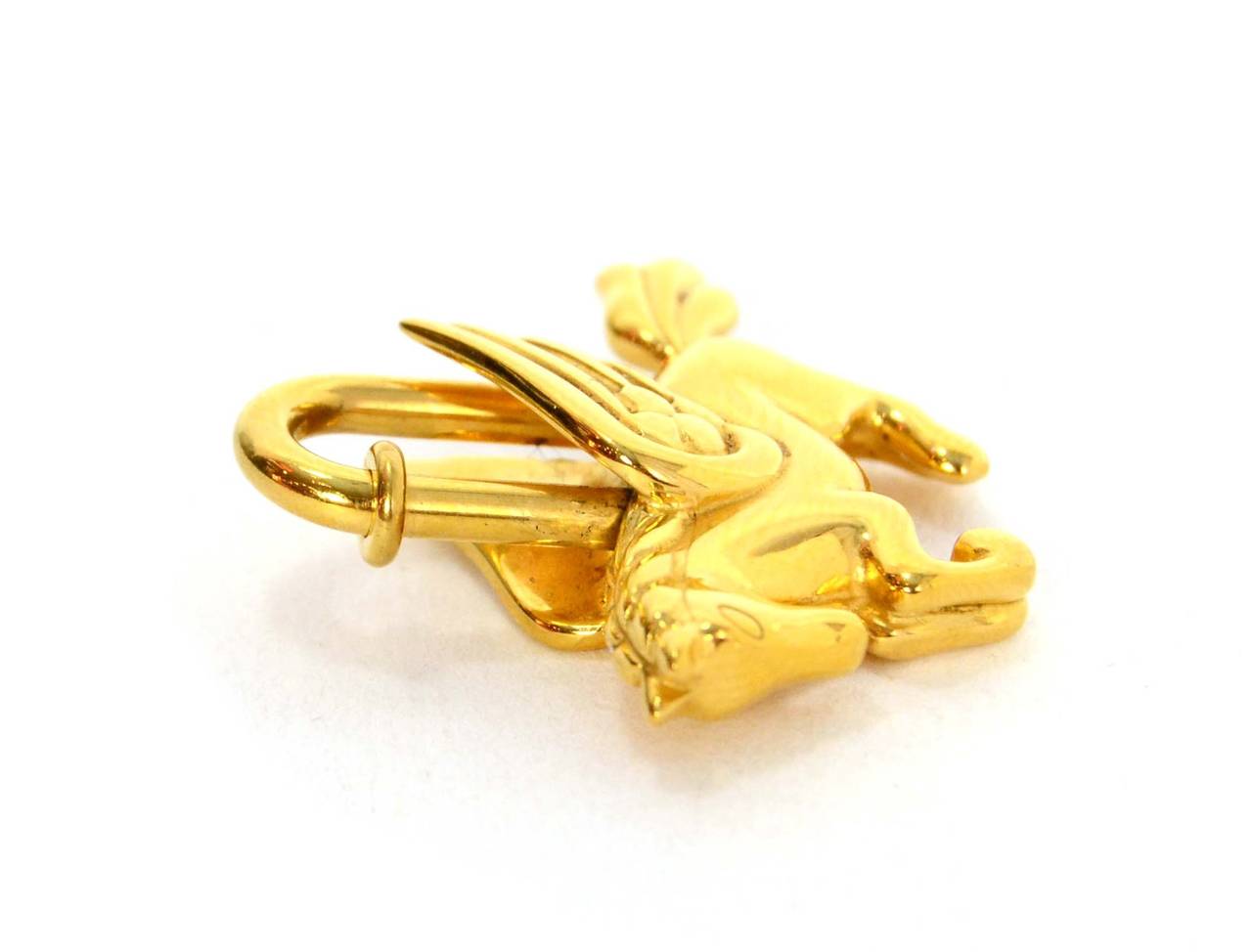 Hermes Goldtone Pegasus Cadena Lock Charm
Stamp: Hermes
Closure: Push lever on goldtone loop
Color: Goldtone
Materials: Metal
Overall Condition: Excellent with the exception of very faint, small surface scratches