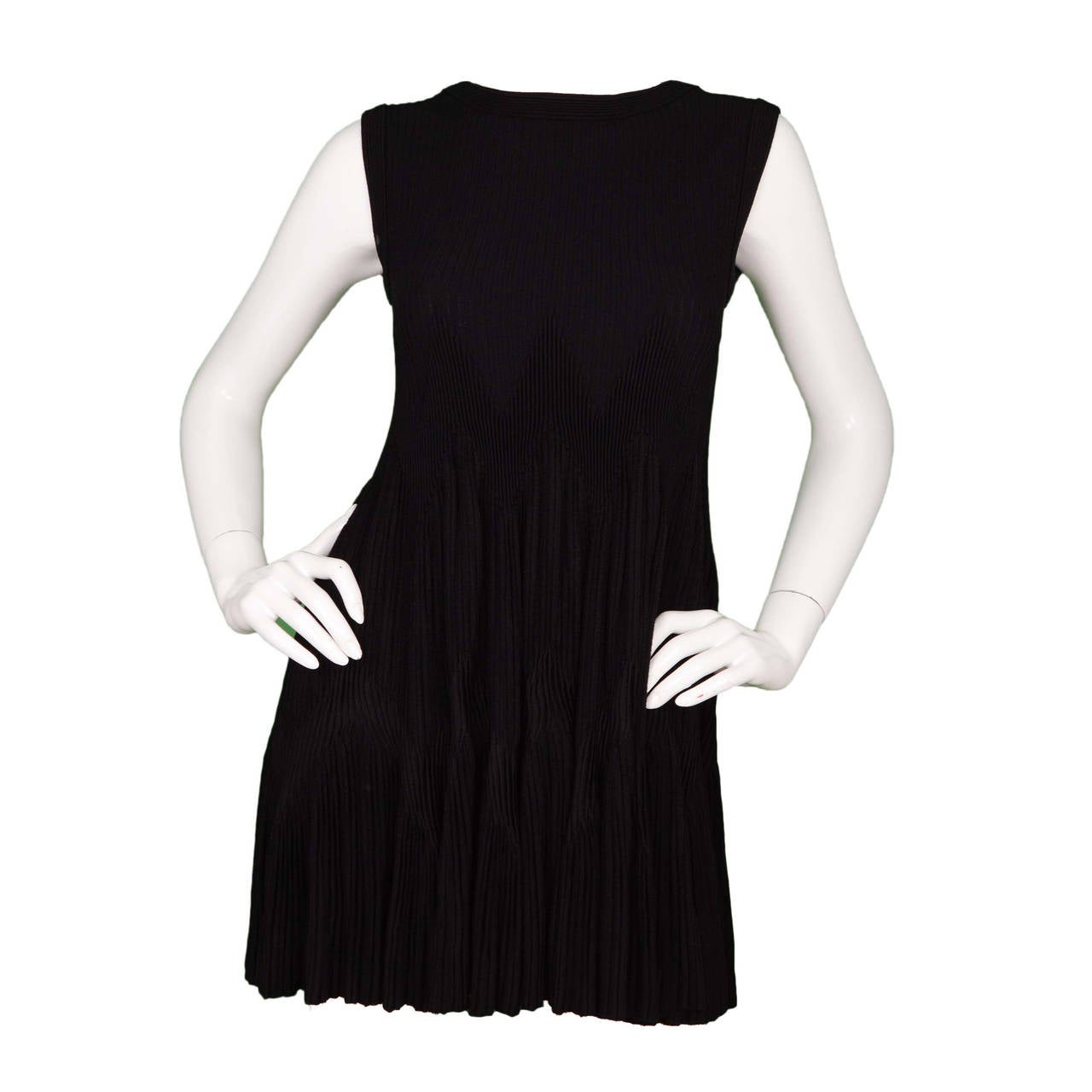 Alaia Black Sleeveless Zigzag Trapeze Dress
Features micro-pleats throughout
Made in: Italy
Color: Black
Composition: 90% viscose, 5% nylon, 5% polyester
Lining: None
Closure/opening: Pull-on dress
Exterior Pockets: None
Interior Pockets: