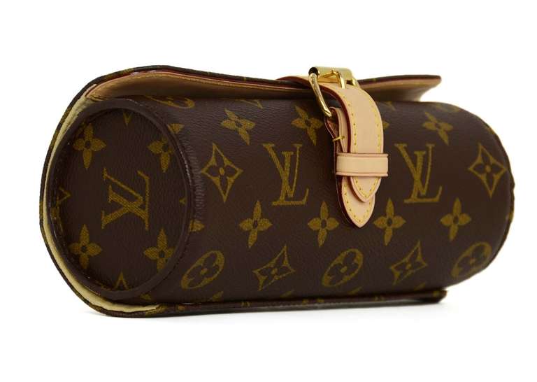 Louis Vuitton Monogram Bracelet/Watch Case Holder Rt, $860

    Age: c. 2008
    Made in France
    Materials: coated canvas, leather
    Strap and buckle closure
    Blind date stamp: SP2088
    Stamped 