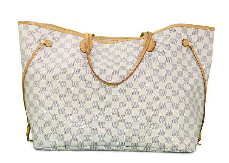 Louis Vuitton Damier Azur Neverfull GM Rt. $1,100

    Age: c. 2012
    Made in USA
    Materials: coated canvas, leather
    Classic Neverfull has interior zippered pocket and center hook closure
    Blind date stamp: SD2142
    Stamped