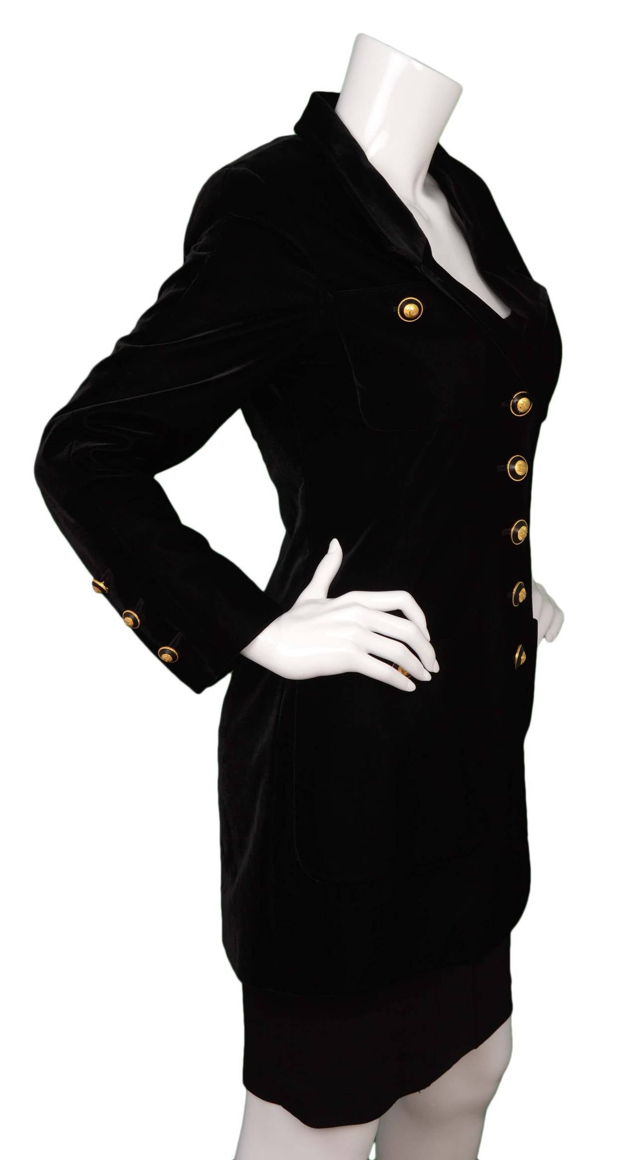 Chanel Vintage Black Velvet Long Jacket
Features goldtone and black CC buttons
Color: Black
Composition: Missing composition tags- believed to be Velvet
Lining: Believed to be 100% silk
Closure/opening: Front and center button down
Exterior