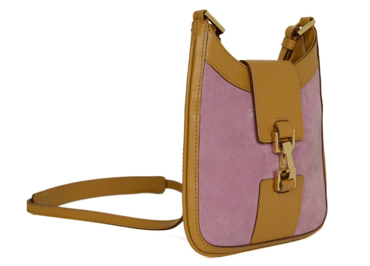Gucci Pink Suede & Tan Leather Mini Bag
Made in: Italy
Color: Pink, tan and goldtone
Hardware: Goldtone
Materials: Suede, leather and metal
Lining: Gucci logo satin-blend textile
Closure/opening: Open top with leather strap and metal hinge