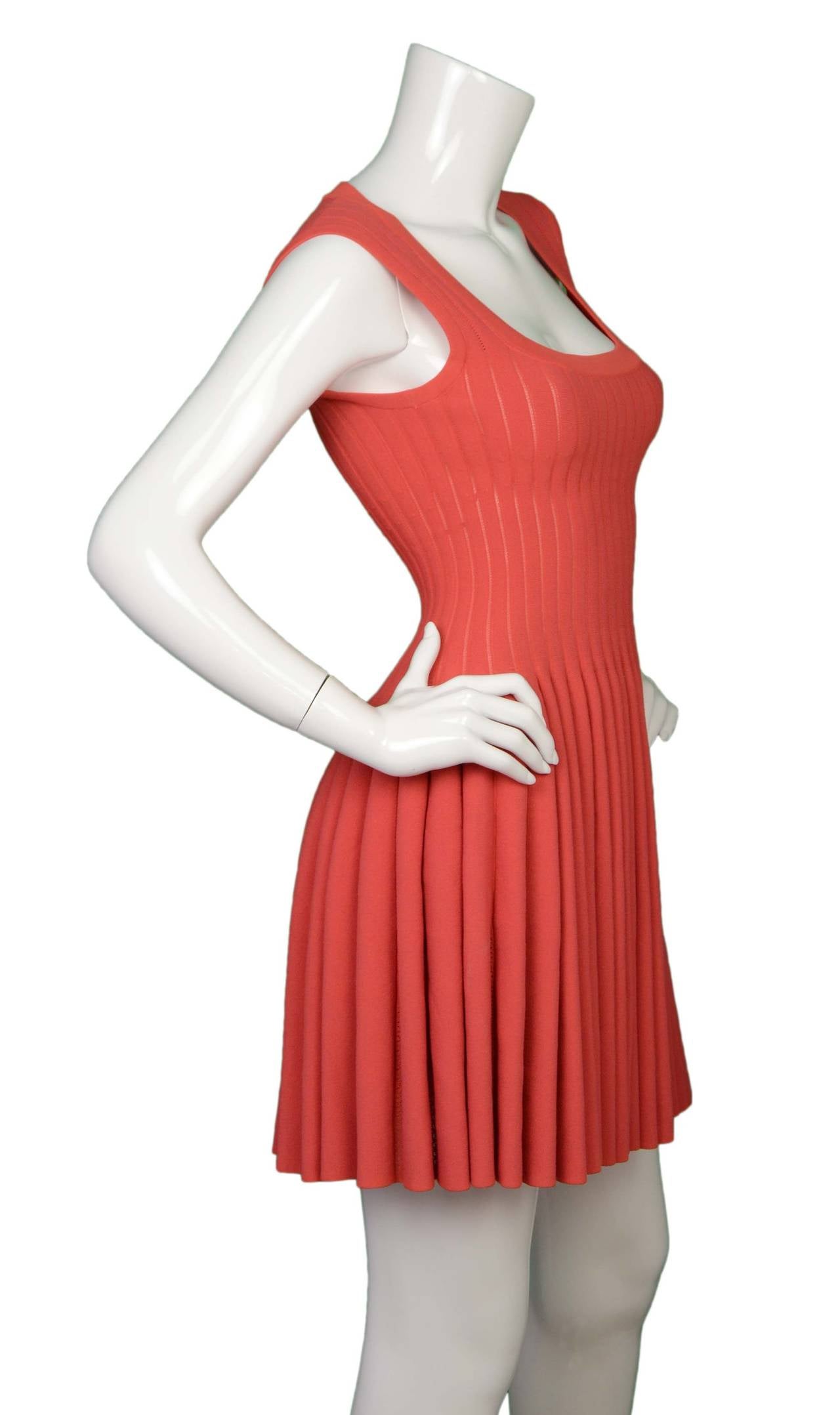 Alaia Coral Sleeveless Ribbed Fit Flare Dress
Made in: Italy
Color: Coral
Composition: 82% viscose, 10% polyester, 6% nylon, 2% elastane
Lining: None
Closure/opening: Back center zipper
Exterior Pockets: None
Interior Pockets: None
Overall