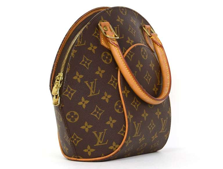 Louis Vuitton Monogram Elipse PM Bag

    Age: c. 1998
    Made in France
    Materials: coated canvas, leather
    Small interior slip pocket
    Top zipper closure
    Blind date stamp: VI0928
    Stamped 