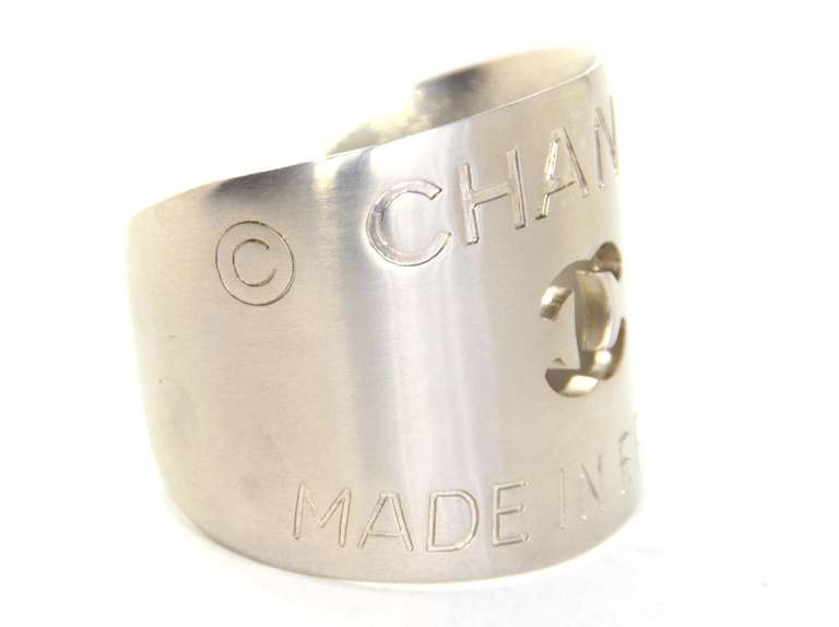 Chanel Silvertone Logo Cuff W/Cutout CC

    Age: c. 1999
    Made in France
    Materials: brushed silvertone metal
    Stamped 