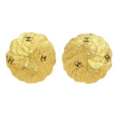 CHANEL Vintage '87 Textured Gold Disc Clip On Earrings