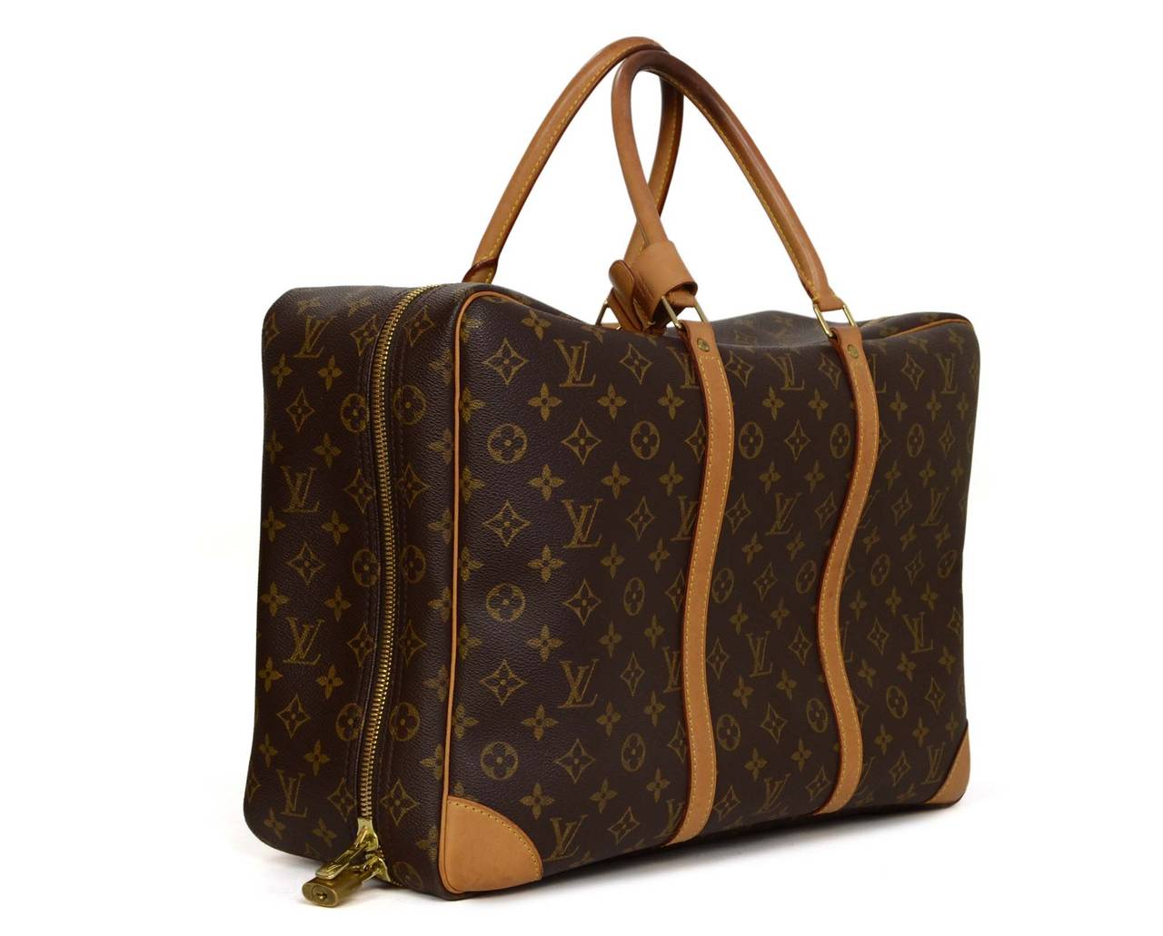Louis Vuitton Monogram Canvas Sirius 45 Luggage
Made in: France
Year of Production: 2003
Color: Brown, tan and goldtone
Hardware: Goldtone
Materials: Coated canvas, leather and metal
Lining: Beige textile
Closure/opening: Double zip around
