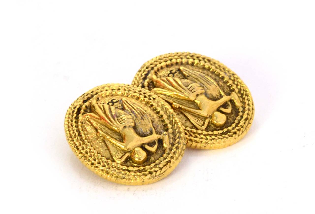 Chanel Vintage '90s Gold Angel Medallion Clip On Earrings
Features image of angel and small CC in corner
Made in: France
Year of Production: 1990-1992
Stamp: Chanel CC Made in France
Closure: Clip on
Color: Goldtone
Materials: Metal
Overall