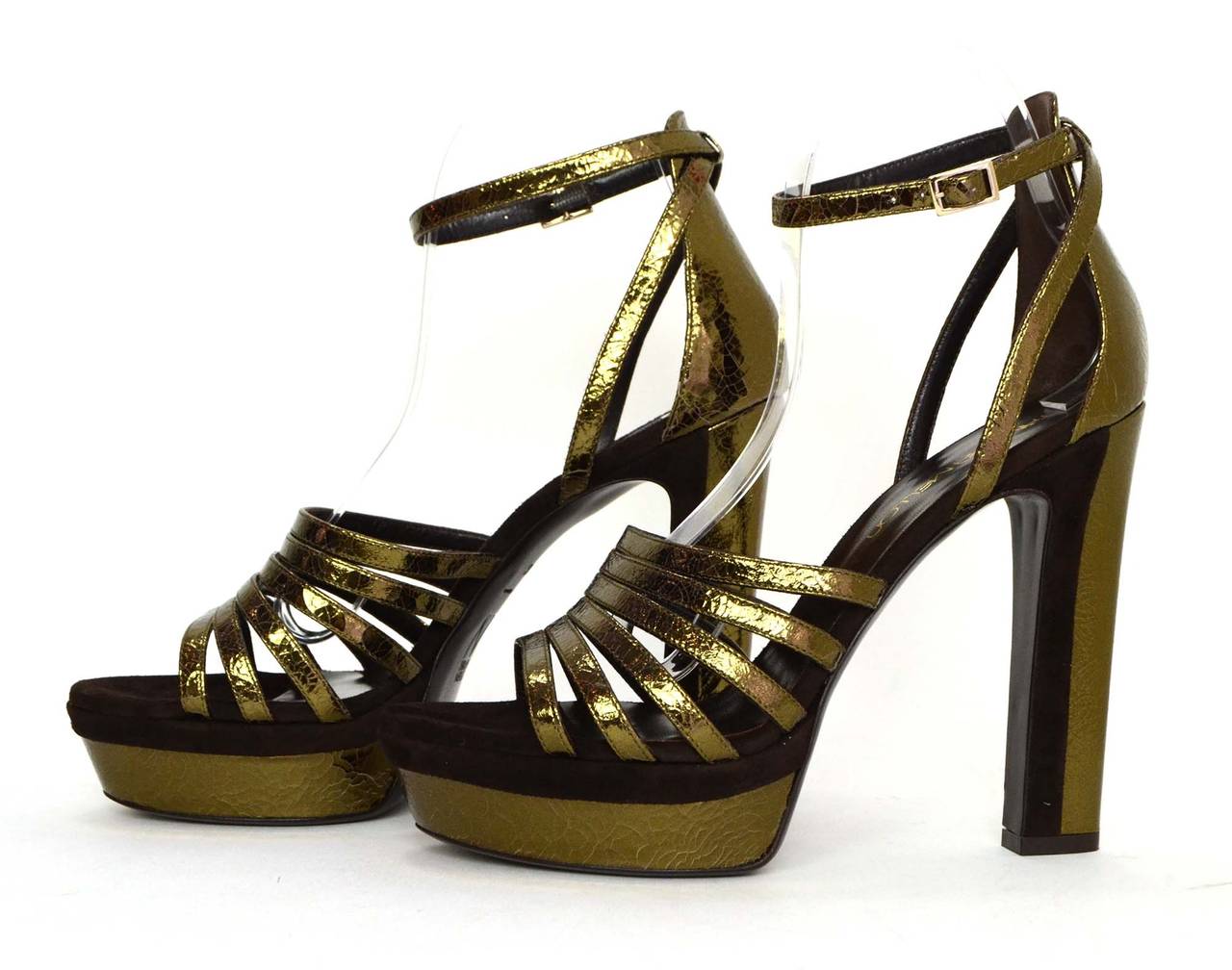 Tamara Mellon Bronze "Supreme 105" Metallic Strappy Platform Sandals
Bronze leather features a distressed crackle effect throughout
Made in: Italy
Color: Metallic bronze and brown
Composition: Leather and suede
Sole Stamp: Made in