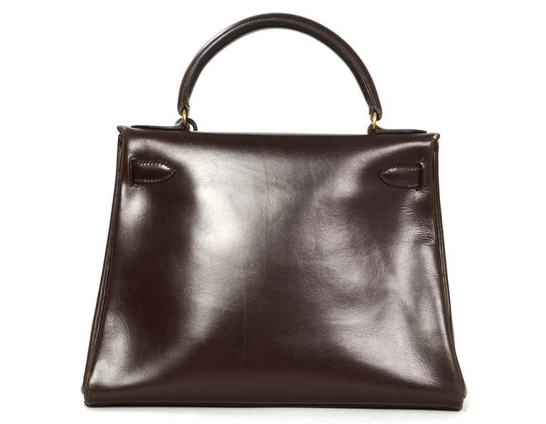 Chocolate Retourne Kelly 28cm in Box Calf Leather with Gold