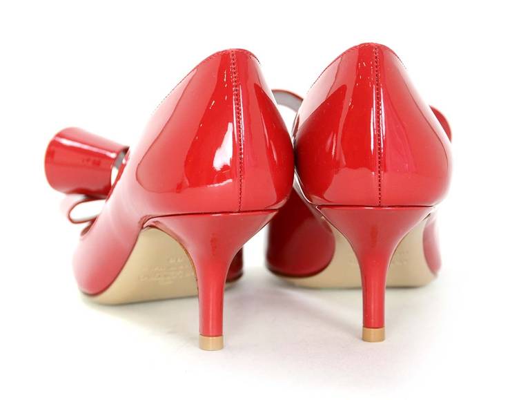 red kitten heels with bow