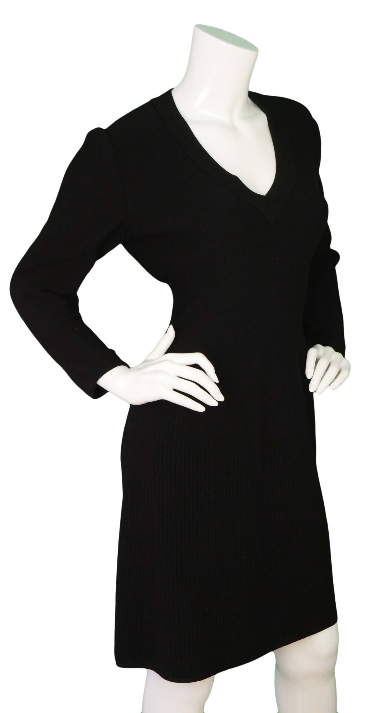 Alaïa Black Ribbed Wool 3/4 Sleeve V-Neck Dress
Features elastic waistline
Made in: Italy
Color: Black
Composition: 72% Wool, 22% polyamide, 6% elastodiene
Lining: None
Closure/opening: Back center zipper
Exterior Pockets: None
Interior