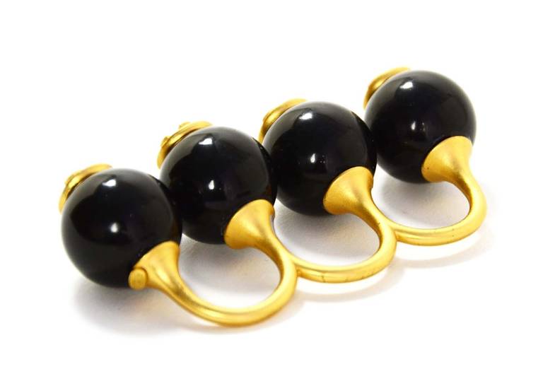 Made in France
    Features three resin black balls with goldtone CC in circles.
    Comes with Chanel box

Total width: 3.25
Ball diameter: .8