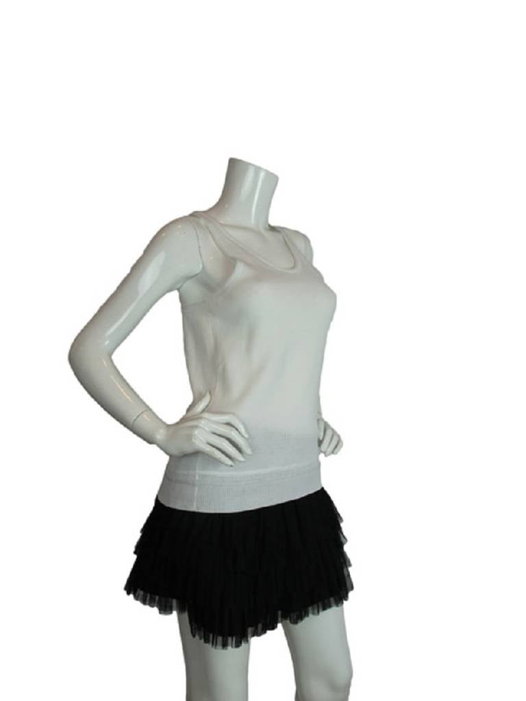 Chanel ribbed racerback cotton racer back top

    Age: 2008
    Made In Italy
    Materials: 100% Cotton

    Bust: 32