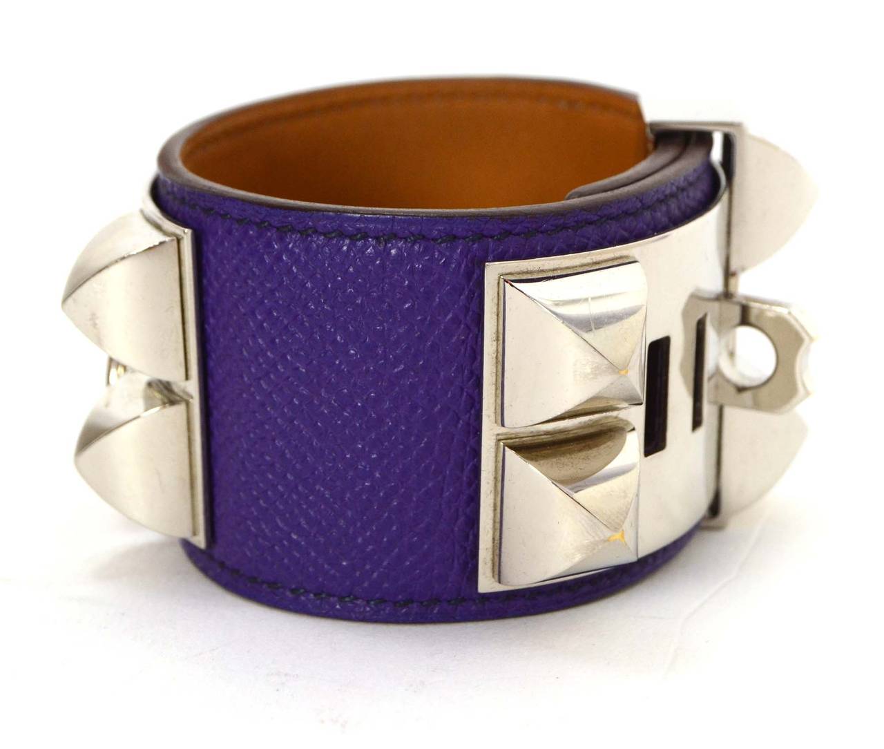 Hermes Purple Epsom Leather CDC Cuff
Made in: France
Year of Production: 2011
Color: Purple and silver
Materials: Epsom leather and metal
Stamps: O stamp in square
Closure: Adjustable slide lock with notches
Hardware: Palladium
Overall