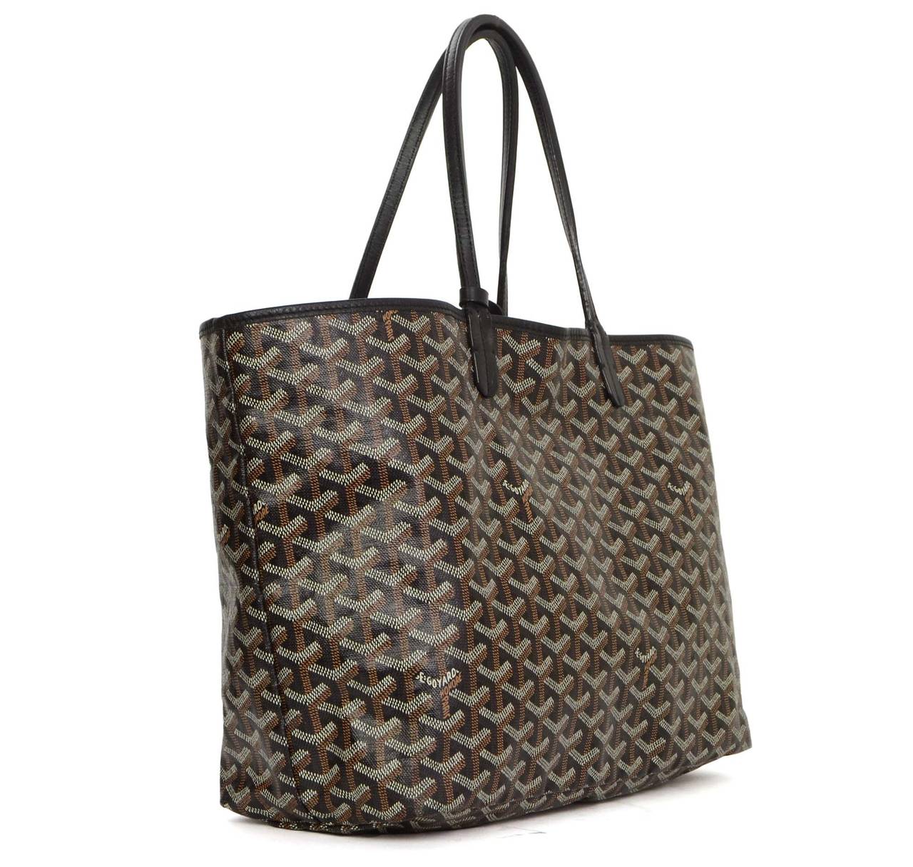 Goyard Chevron Print Coated Canvas St. Louise PM Tote
Features matching insert attached to shoulder strap
Made in: France
Color: Black, white and brown
Hardware: None
Materials: Coated canvas
Lining: Beige canvas
Closure/opening: