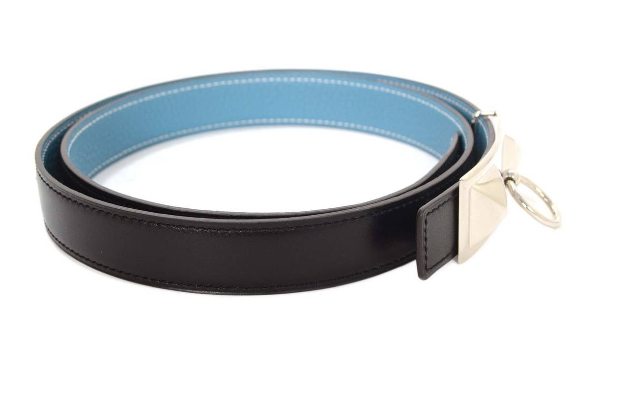 Hermes Black & Pale Blue Leather Reversible Medor Belt
Made In: France
Year of Production: 2008
Color: Black, pale blue, and silvertone
Hardware: Palladium
Materials: Leather and metal
Closure/Opening: Stud and notch closure
Stamp: L stamp in