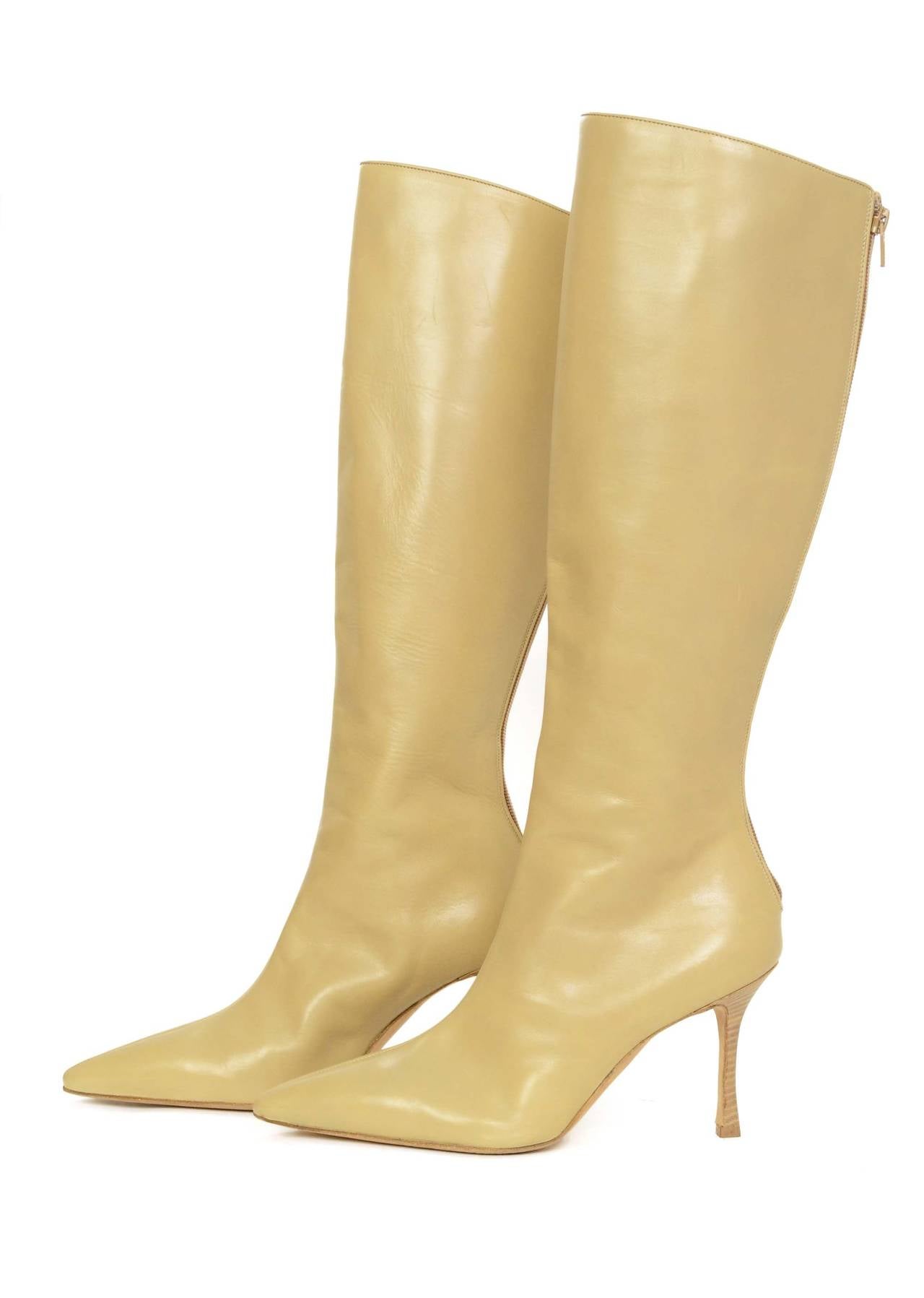 Manolo Blahnik Nude Leather Tall Pointed Toe Boots
Made In: Italy
Color: Nude
Materials: Leather
Closure/Opening: Back zipper
Sole Stamp: Hand made in Italy Manolo Blahnik 39
Overall Condition: Excellent pre-owned condition with the exception