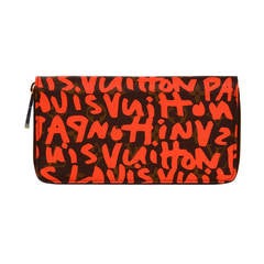 Louis Vuitton Limited Edition Stephen Sprouse Portefeuille zippé graffiti orange fluo
