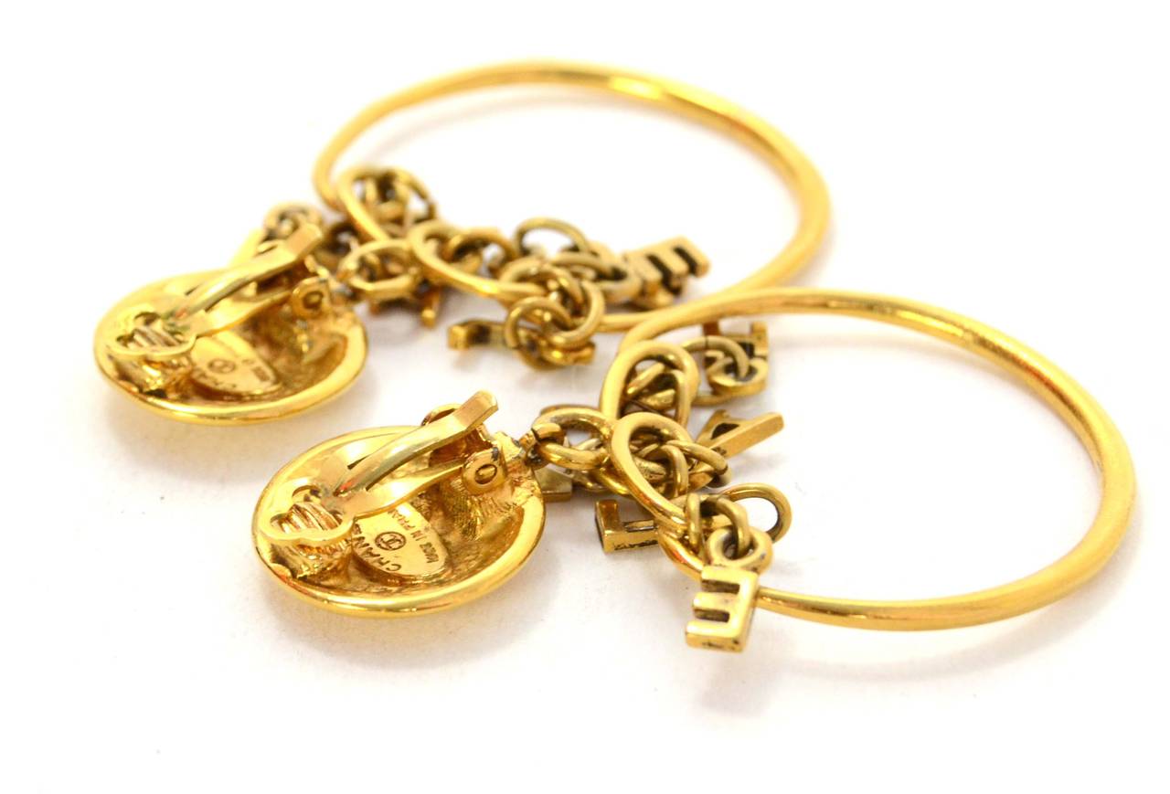 Chanel Vintage '80s Gold Charm Hoop Clip On Earrings In Excellent Condition In New York, NY