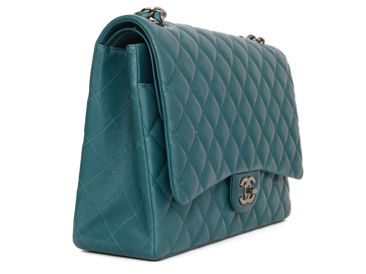 Chanel Teal Quilted Lambskin Classic Maxi Double Flap Bag 
Features adjustable leather woven chain link shoulder straps

Made In: Italy
Year of Production: 2011
Color: Teal
Hardware: Ruthenium
Materials: Leather and metal
Lining: Teal