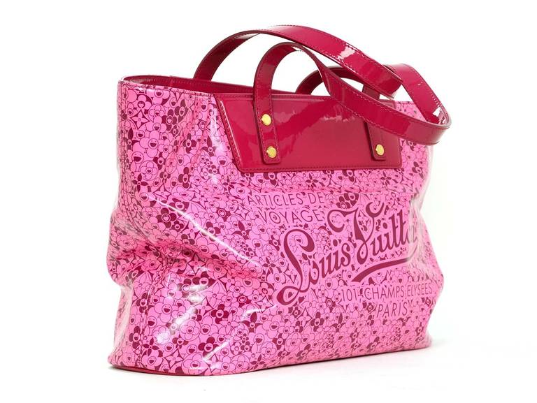 c.2010

Part of a collaboration between Takashi Murakami & Louis Vuitton.

Shiny rose pink vinyl with patent leather handles and trim.

Cherry blossom print stamped 