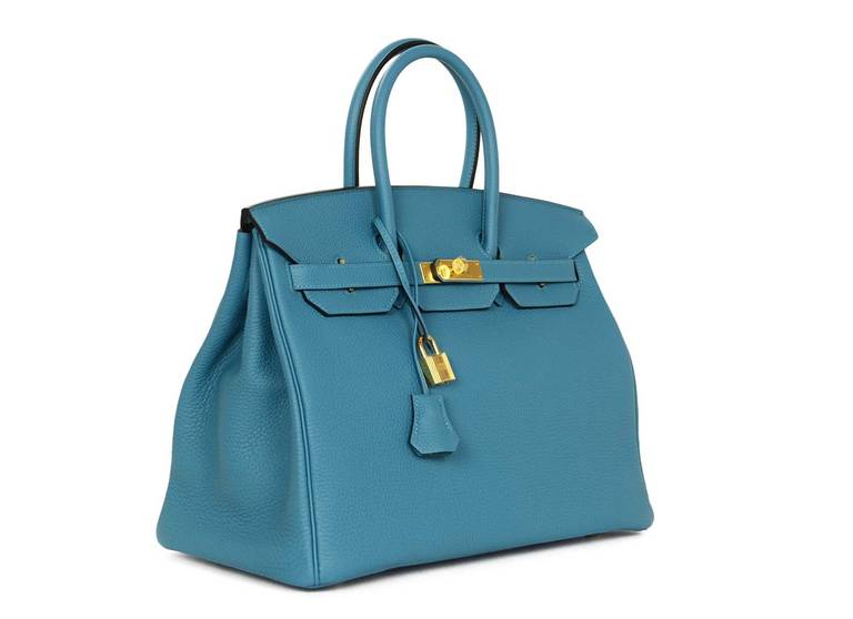 Hermes 35cm Turquoise Togo leather Birkin Bag

Brand New in Box.

Never carried.

All protective plastic still in place.

R stamp - c.2014

Stamped 