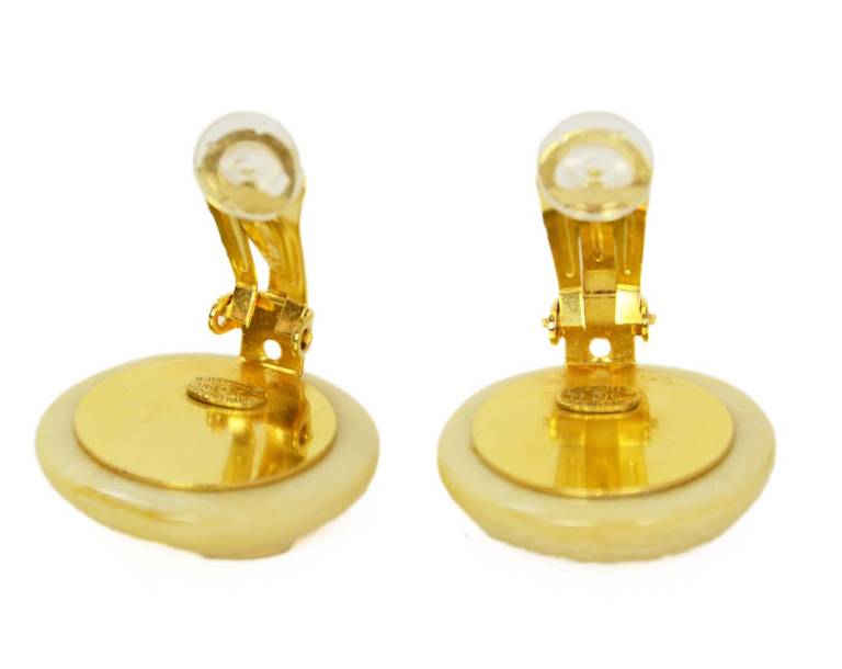 Chanel Vintage '96 Ivory Circle CC Clip-on Earrings

Made in: France
Year of Production: 1996
Materials: Resin
Stamps: 96 CC C
Closure: Clip-on with comfort cushion
Hardware: Goldtone
Includes: Chanel box
Overall Condition: Excellent
Includes: