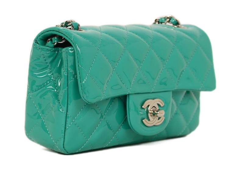 CHANEL Seafoam Green Quilted Mini Flap Bag

    Made in: France
    Year of Production: 2012
    Materials: Patent leather
    Hardware: Silver hardware
    Lining: Lambskin leather
    Serial Number:16344491
    Interior Pockets: Two