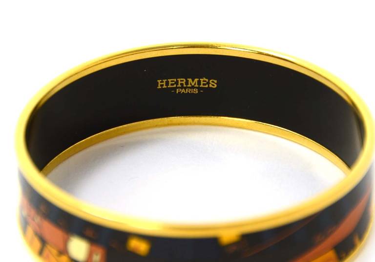 HERMES Navy And Gold Zodiac Print Enamel Bangle In Excellent Condition In New York, NY