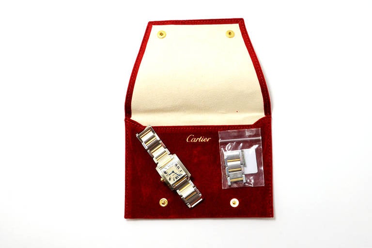 Cartier 18k Yellow Gold and Stainless Steel Tank Francaise Medium-Size Wristwatch

Materials:  18k yellow gold and stainless steel
Numbered 544283CD 2465
Measurements: 25 x 29.5mm
The watch is sized now to fit a wrist of 5.5