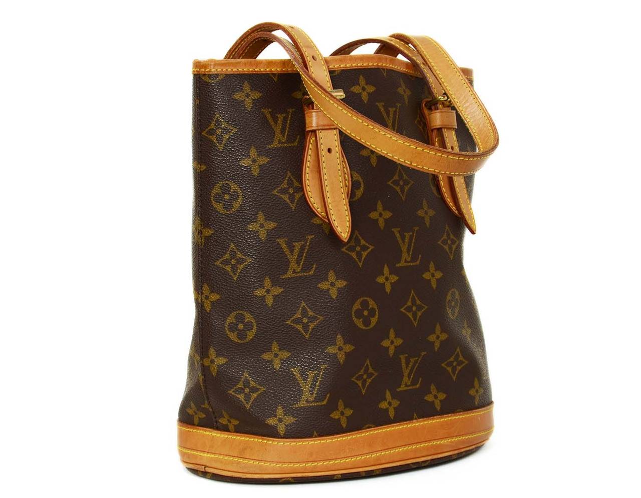 LOUIS VUITTON Monogram Bucket Bag PM

    Made in: France
    Year of Production: 1998
    Color: Classic Louis Vuitton monogram
    Materials: Coated canvas and leather lining
    Lining: Man made lining
    Serial Number: AR1918
   