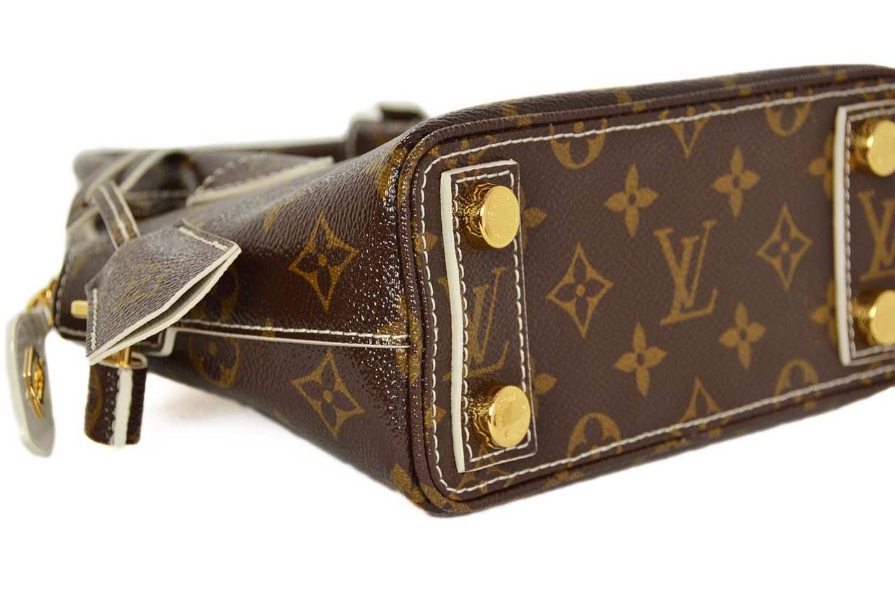 Louis Vuitton Limited Edition Monogram Fetish Lockit BB Bag - Yoogi's Closet