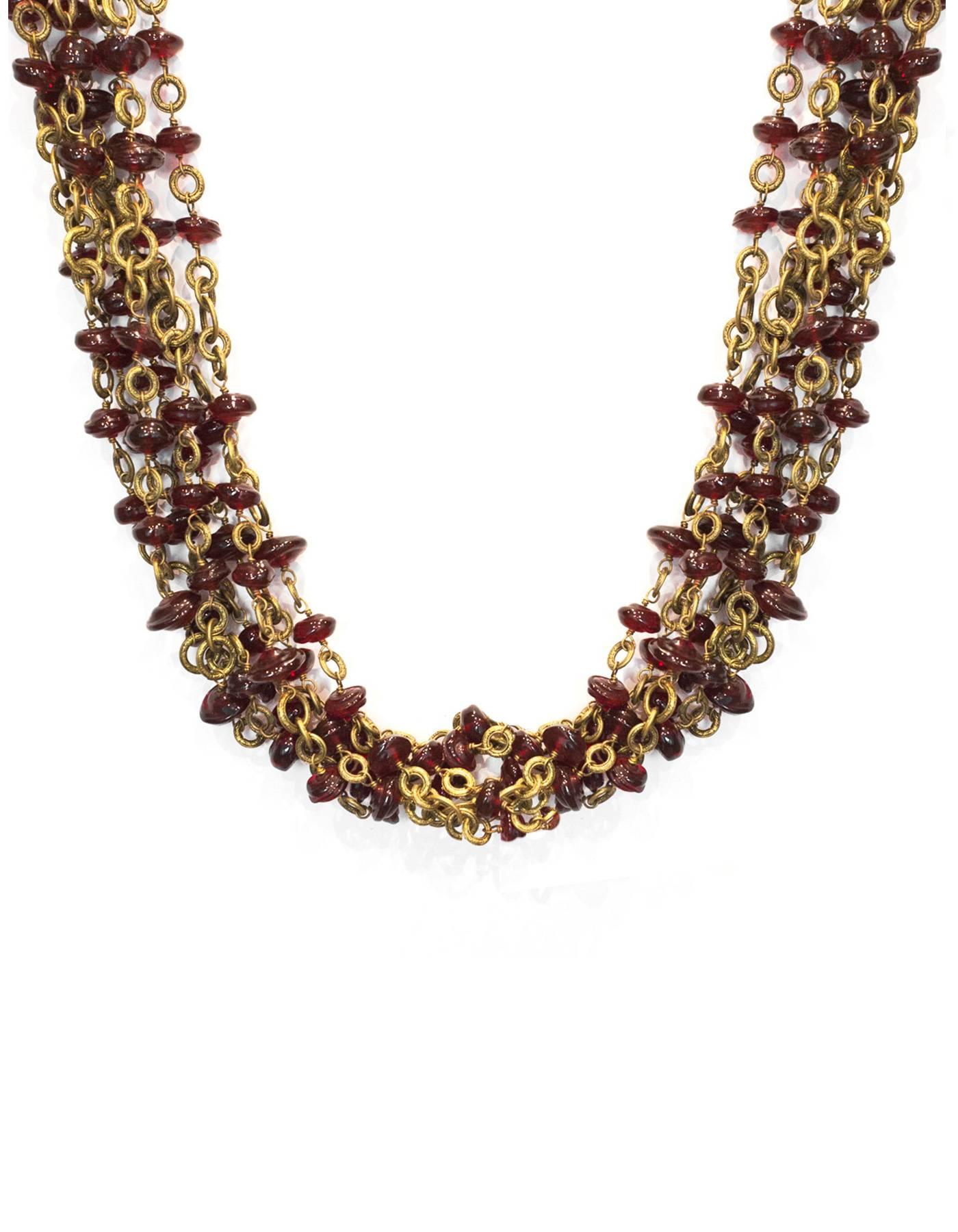 Chanel Vintage '84 Multi-Strand Red Gripoix Chain Link Necklace

Made In: France
Year of Production: 1984
Stamp: Chanel CC 1984
Closure: Antique clasp
Color: Red and goldtone
Materials: Metal and poured glass
Overall Condition: Excellent vintage