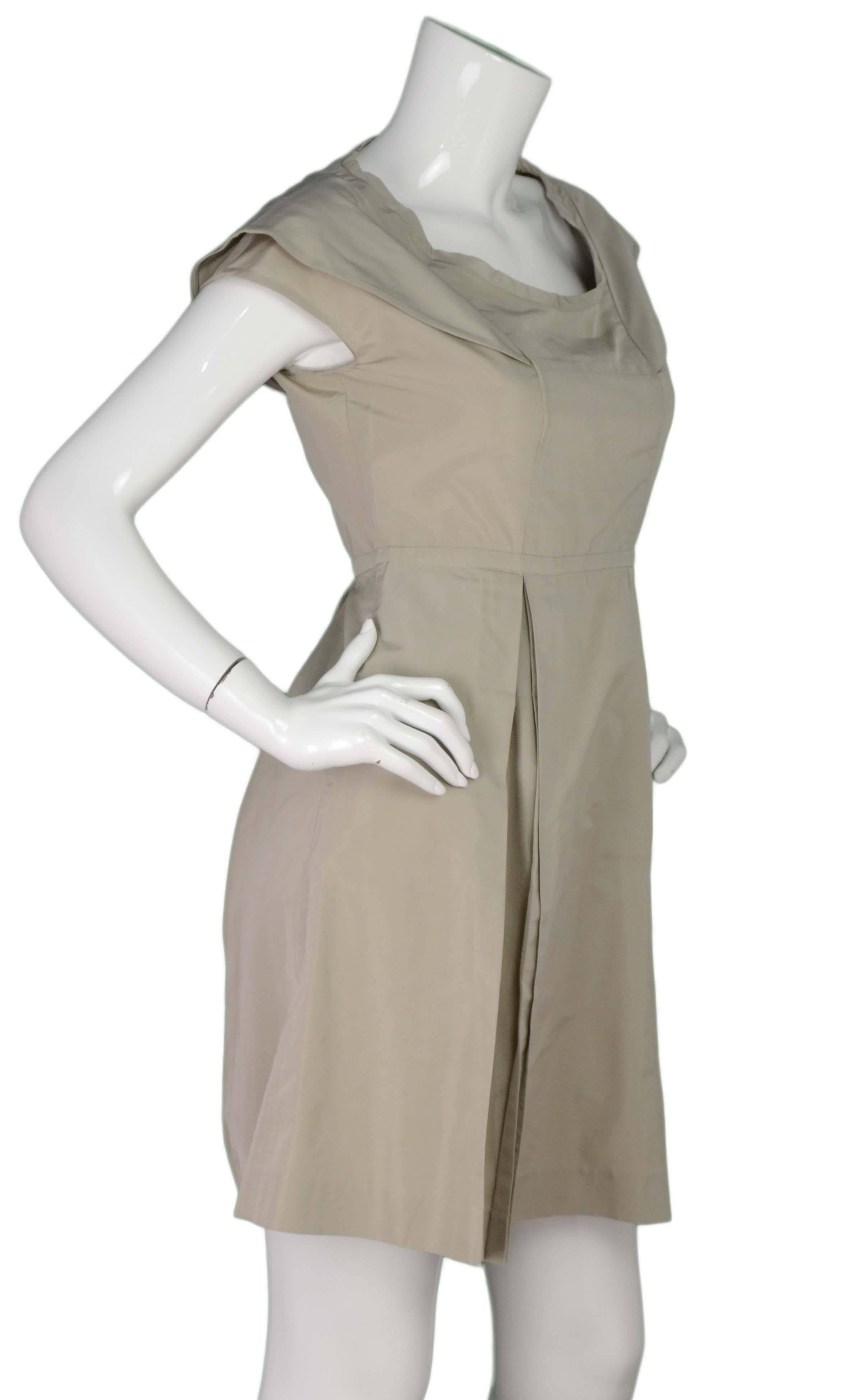 Miu Miu Beige Pleated Cap-Sleeve Dress 
Features double layered cap-sleeves and a scoop neckline
Made In: Italy
Color: Beige
Composition: 55% Polyester, 45% acetate
Lining: None
Closure/Opening: Side zipper
Exterior Pockets: Two hip