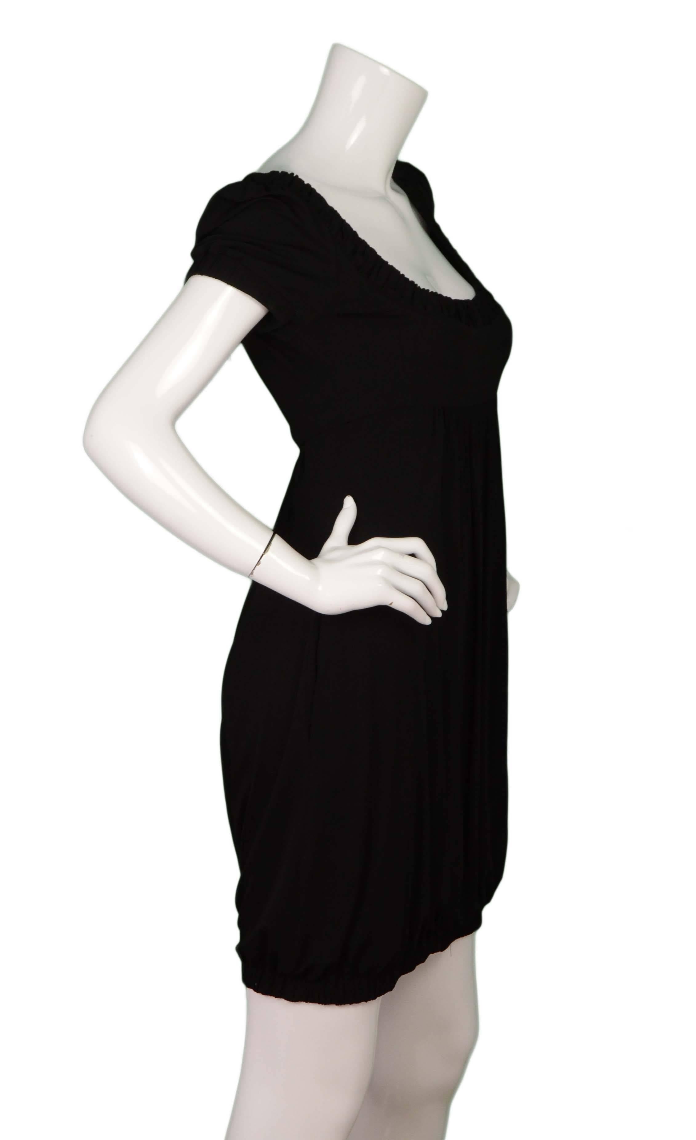 Fendi Black Empire Waist Short Sleeve Dress 
Features ruching at bust and balloon style hemline with elastic
Made In: Italy
Color: Black
Composition: 92% rayon, 8% elastane
Lining: None
Closure/Opening: Side zipper
Exterior Pockets: Two hip