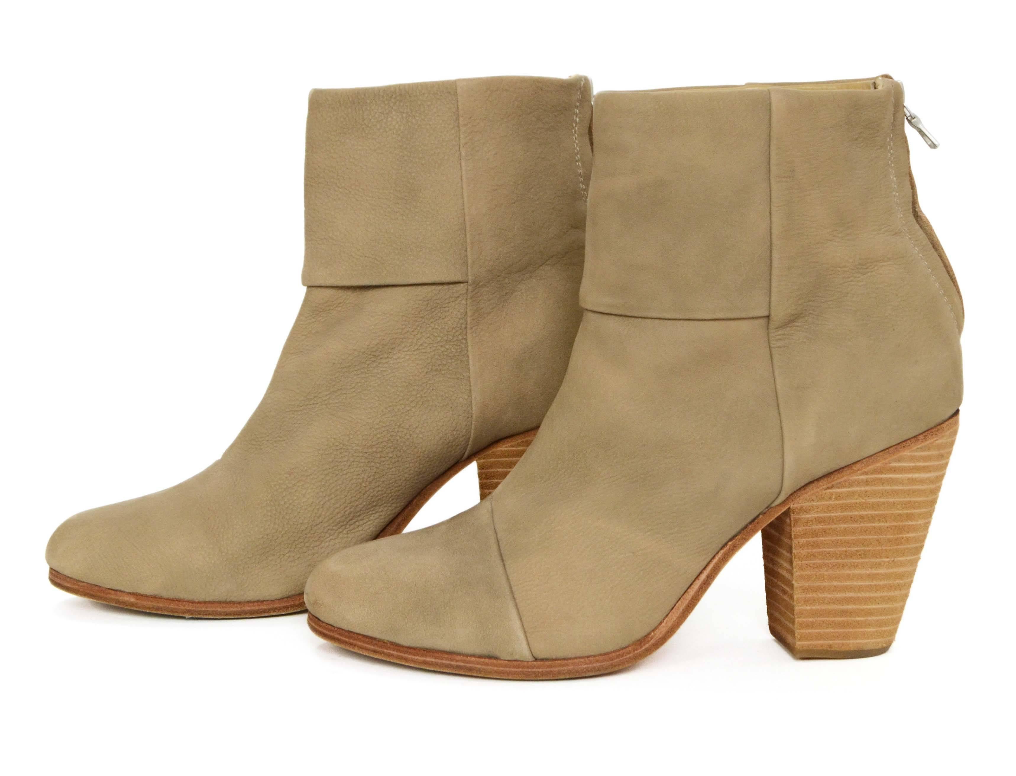 Rag & Bone Beige Leather Ankle Boots 
Features stacked wooden heel
Made In: China
Color: Beige
Composition: Leather
Closure/Opening: Back ankle zipper
Sole Stamp: Rag & Bone New York 39
Overall Condition: Excellent pre-owned condition with