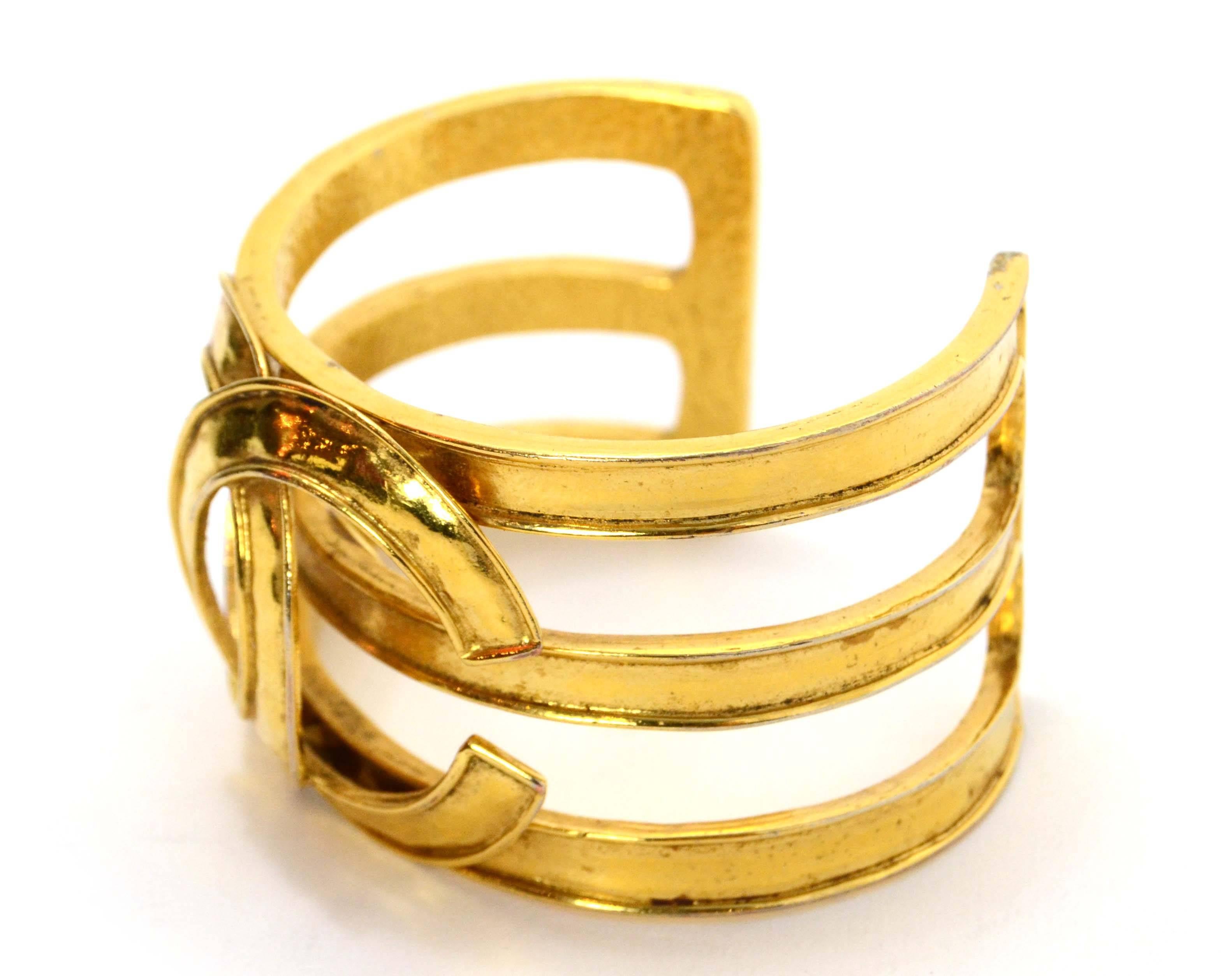 Chanel Vintage '94 Gold Cuff Bracelet 
Features large CC in center 
Made In: France
Year of Production: 1994
Color: Goldtone
Materials: Metal
Closure: None
Stamp: 94 CC P
Overall Condition: Excellent vintage, pre-owned condition with the