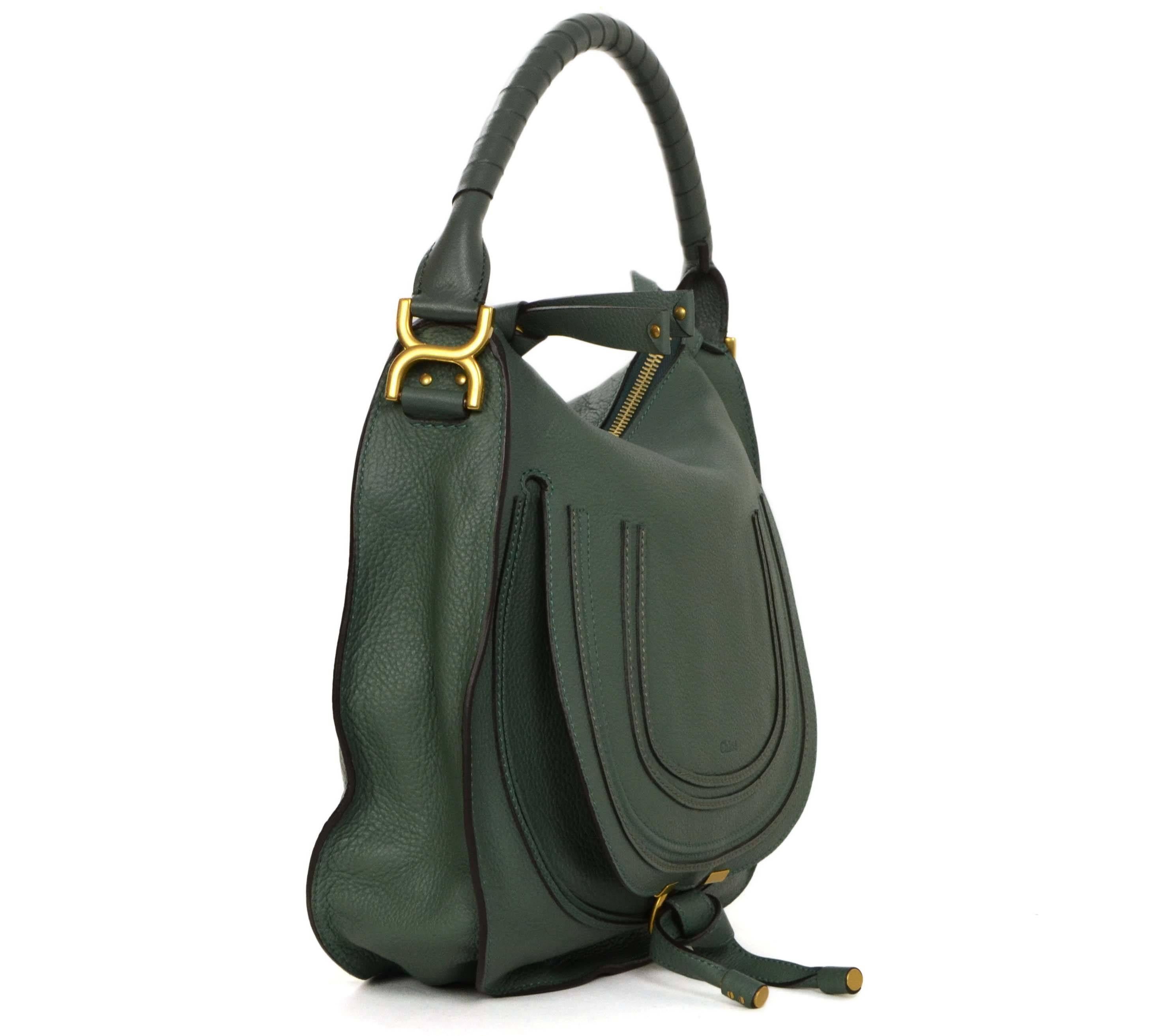 Chloe Green Leather Medium Marcie Hobo Bag 
Features decorative front flap
Made In: Italy
Color: Green
Hardware: Goldtone
Materials: Leather and metal
Lining: Taupe canvas-blend
Closure/Opening: Zip across top
Exterior Pockets: One front