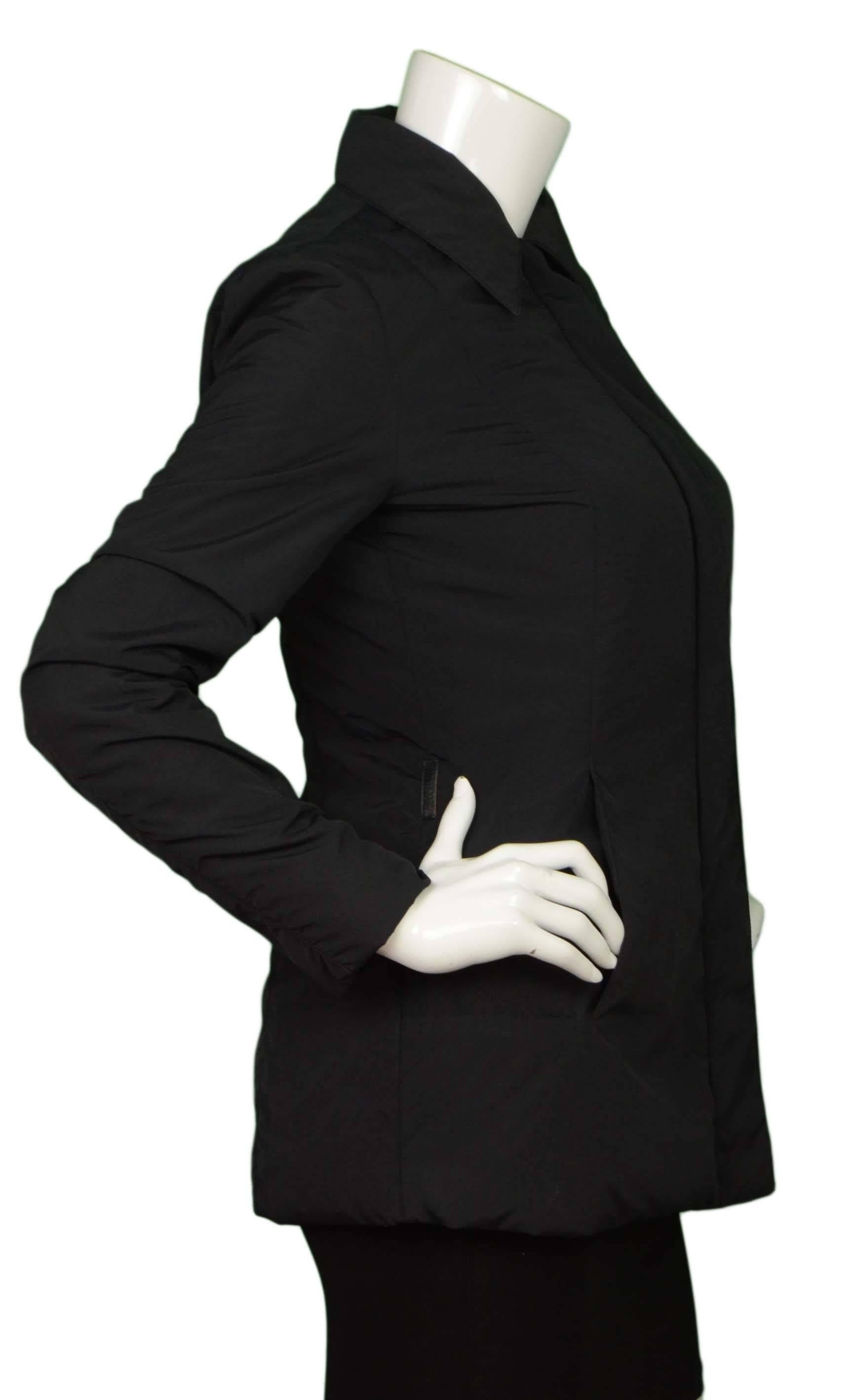Gucci Black Rain Jacket & Removable Fur Vest 
Fur vest snaps into lining of jacket

Made In: Italy
Color: Black
Composition: Jacket- 53% nylon, 42% polyester, 5% polyurethane, Vest- 100% fur
Lining: Black, 53% nylon, 42% polyester, 5%