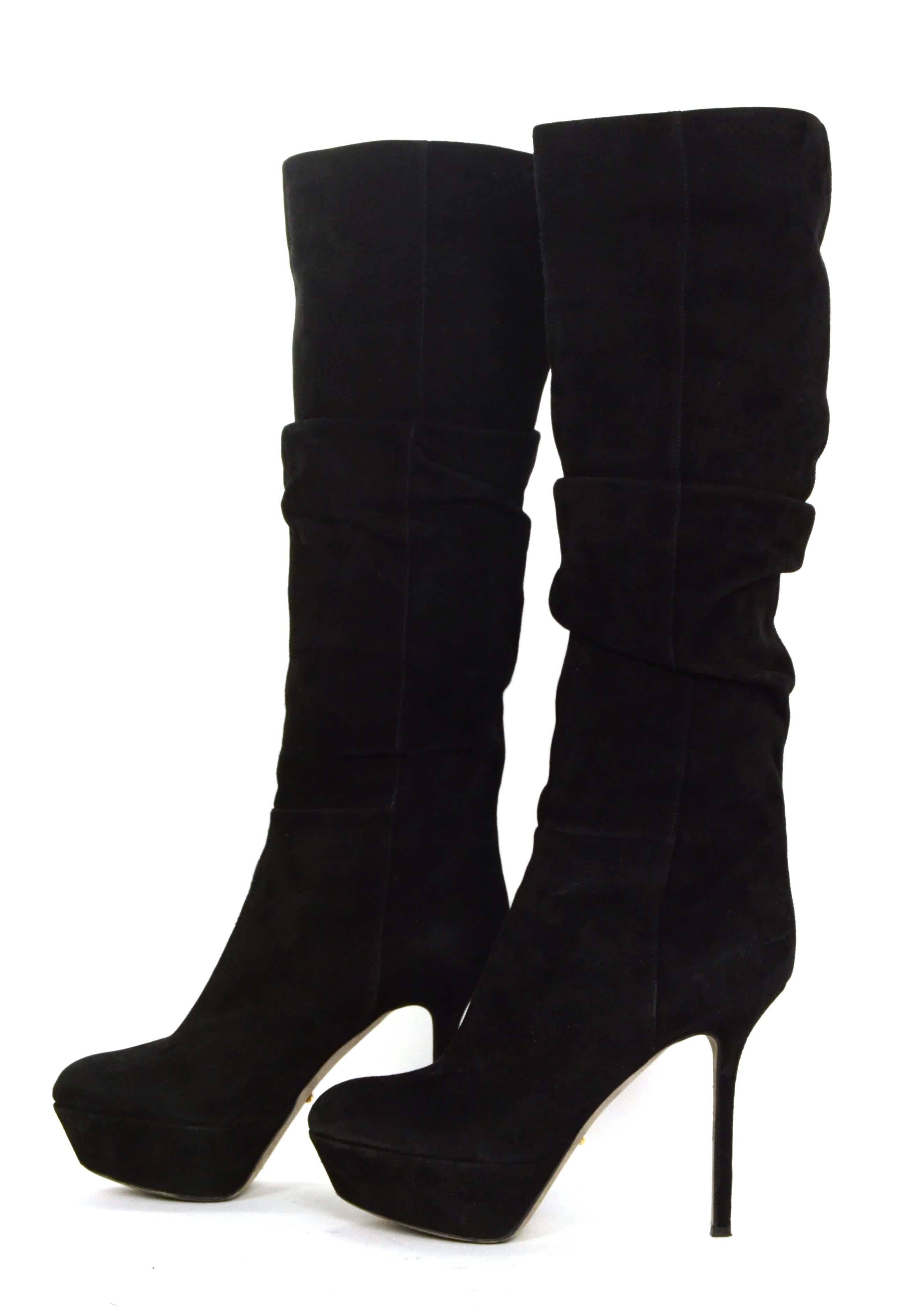 Sergio Rossi Black Suede Platform Boots 
Features ruching towards top of shaft
Made In: Italy
Color: Black
Materials: Suede
Closure: Pull on
Sole Stamp: Sergio Rossi Vero Cuoio Made in Italy 36 1/2
Retail Price: $1,250 + tax
Overall