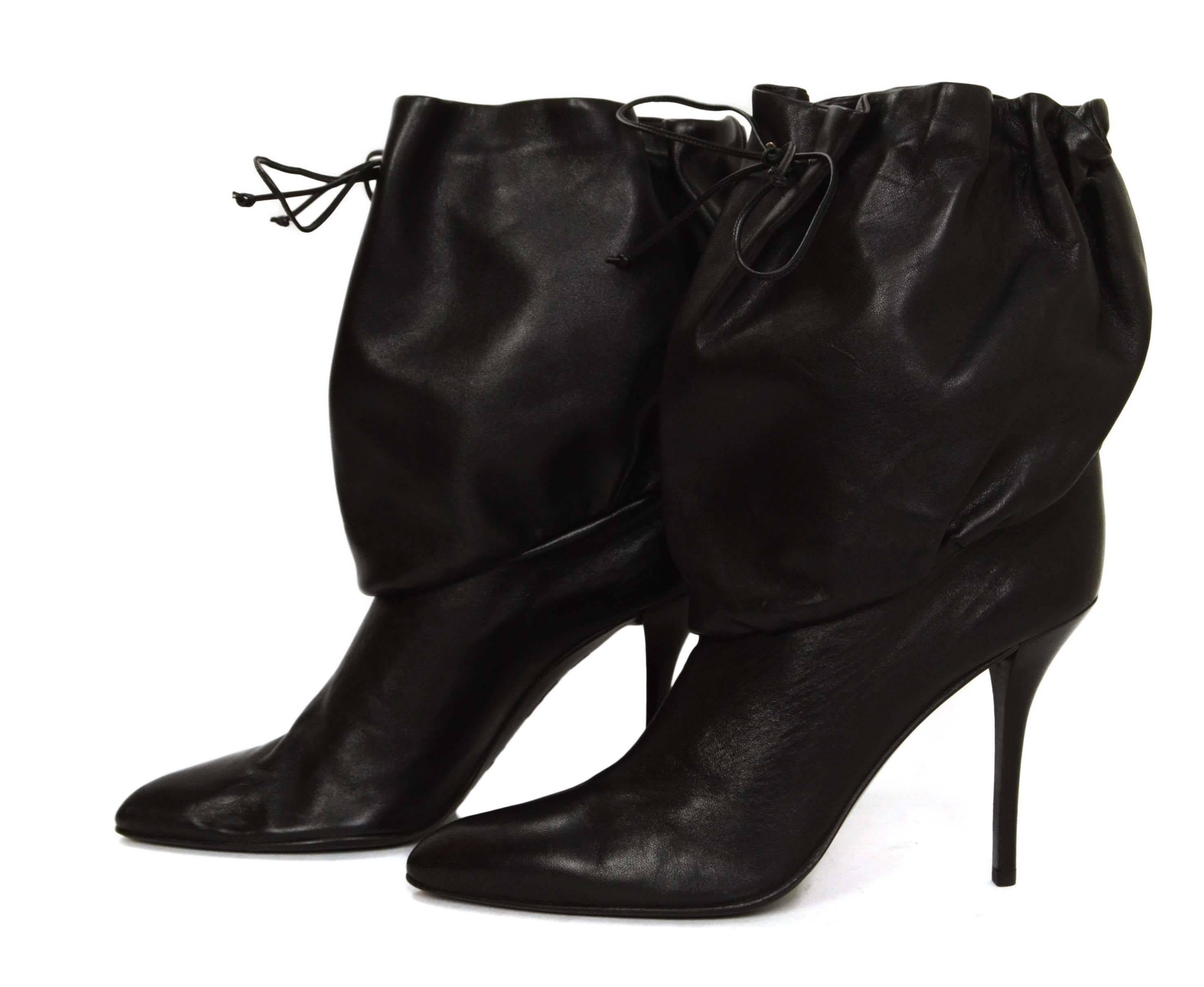 Helmut Lang Black Leather Drawstring Boots 
Made In: Italy
Color: Black
Materials: Leather
Closure/Opening: Pull on with drawstring to tighten and secure closure
Sole Stamp: Helmut Lang Made in Italy 40 Very Cuoio
Overall Condition: Excellent