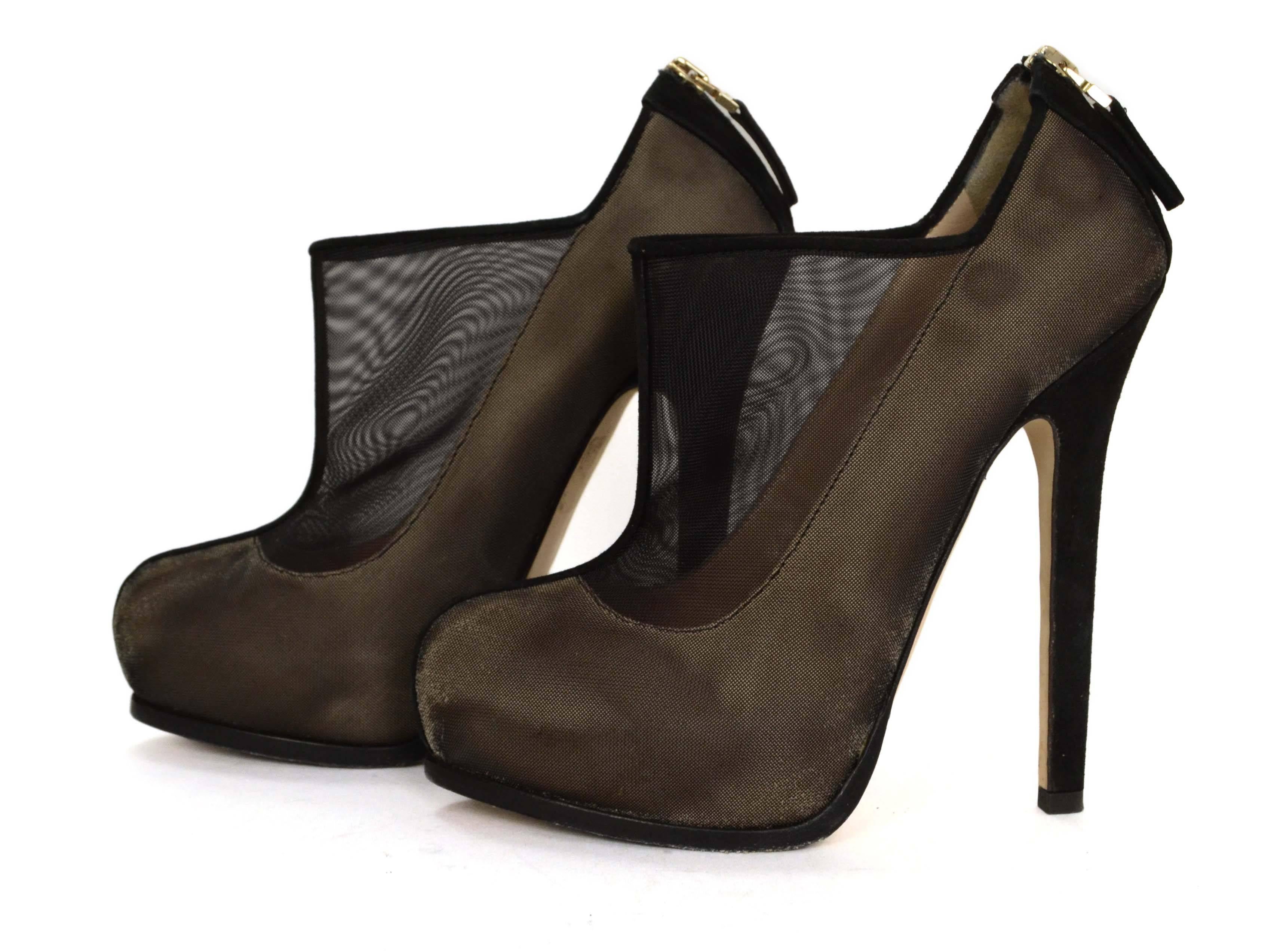 Fendi Black Mesh Platform Pumps 
Features suede wrapped heel and hidden platform
Made In: Italy
Color: Black
Materials: Mesh and suede
Closure/Opening: Back zipper
Sole Stamp: Fendi Made in Italy Vero Cuoio 37
Overall Condition: Excellent