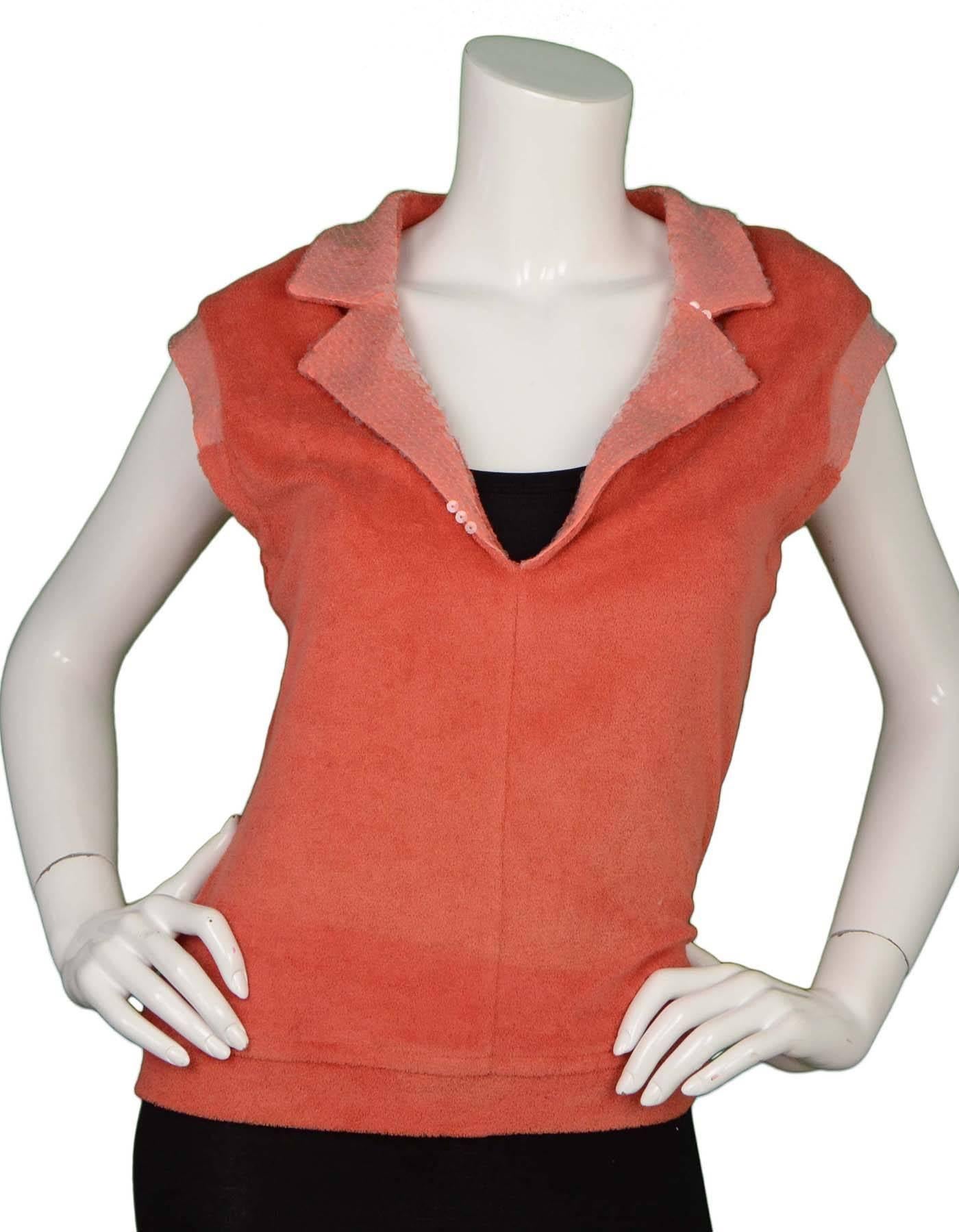 Chanel Coral Terrycloth Sleeveless 
Features clear sequins throughout collar, neckline and arms
Made In: France
Year of Production: 2008
Color: Coral
Composition: 70% cotton, 30% nylon
Lining: Coral, 90% polyester, 10% spandex
Closure/Opening: Pull