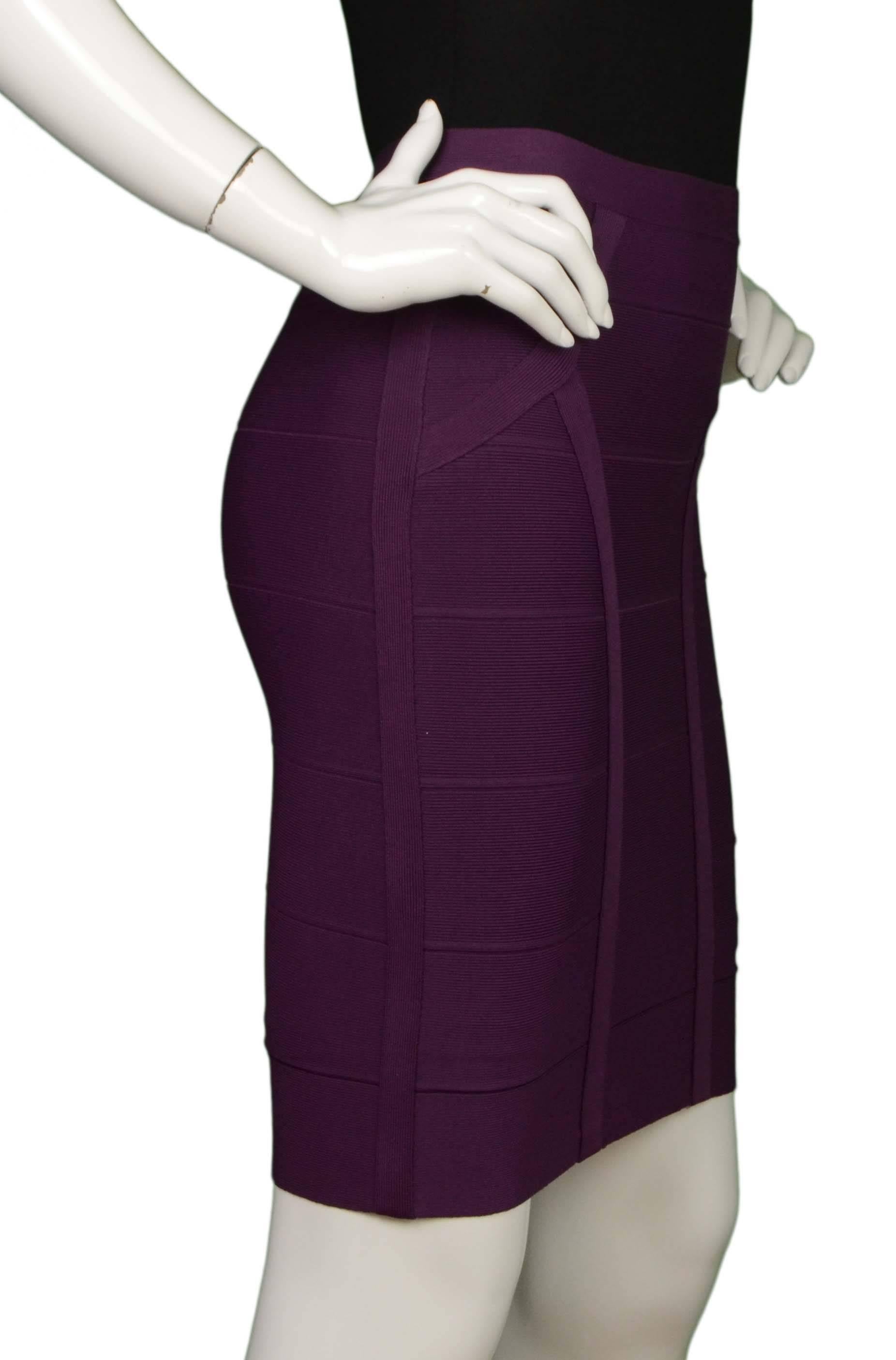 Herve Leger Purple Bandage Skirt 
Made In: China
Color: Purple
Composition: 90% rayon, 9% nylon, 1% spandex
Lining: None
Closure/Opening: Back center zipper and hook and eye closure
Exterior Pockets: None
Interior Pockets: None
Overall