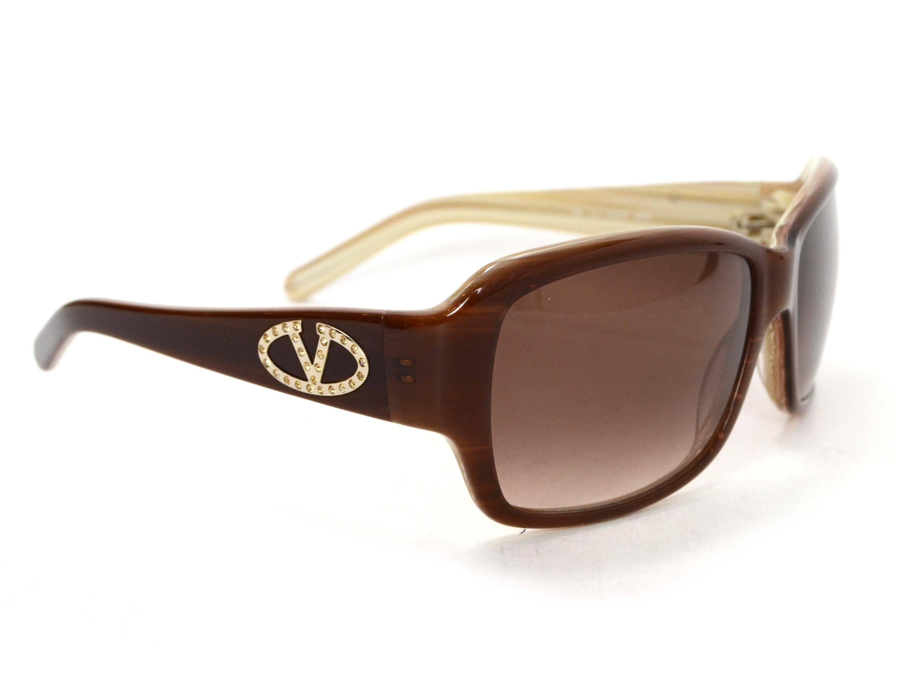 Valentino Brown Square Frame Sunglasses

    Made In: Italy

    Color: Brown, tan

    Materials: Resin, rhinestone

    Overall Condition: Excellent pre owned condition

    Includes: Valentino case

Measurements

Length Across: