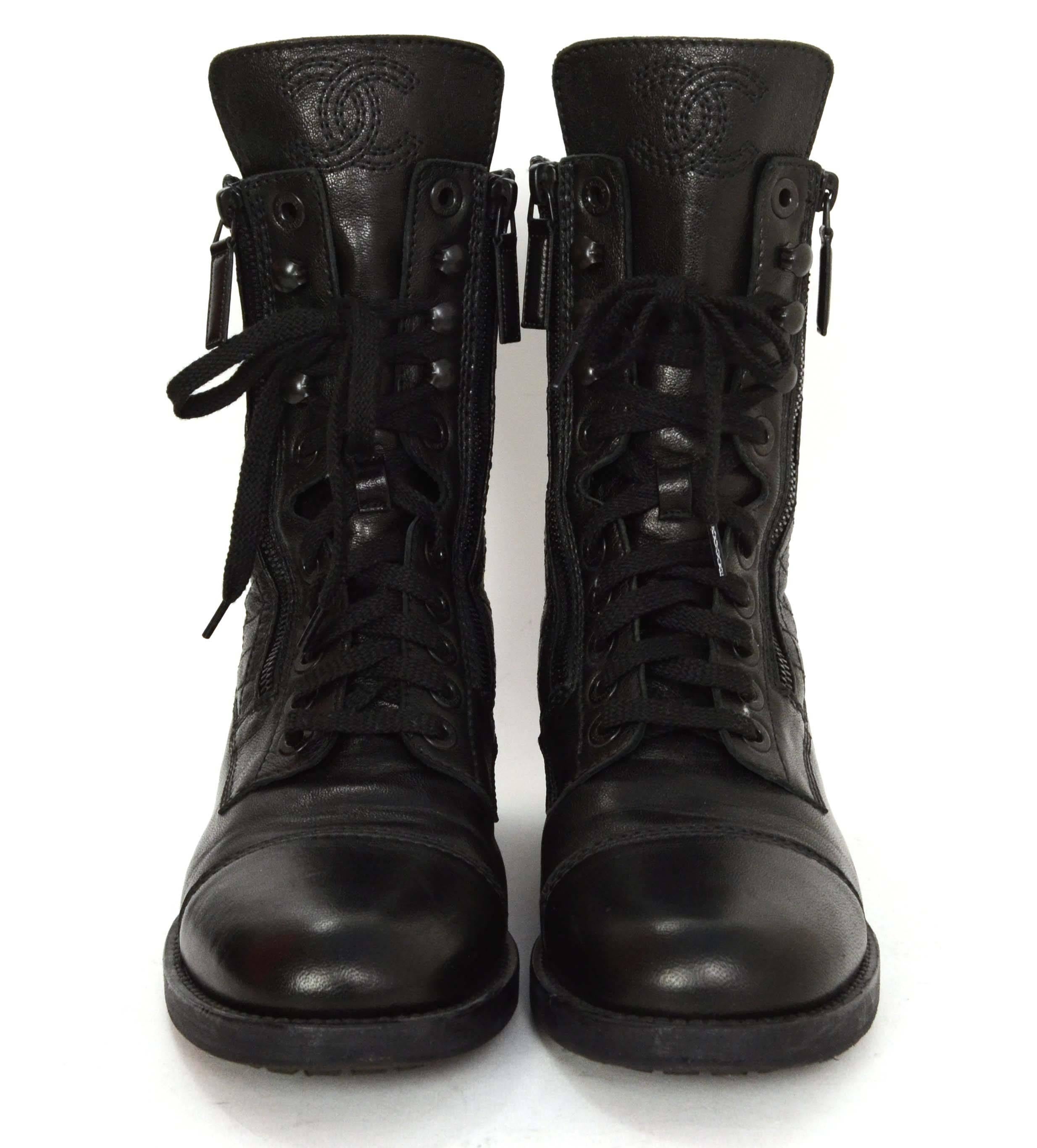 Chanel Black Leather Lace Up Combat Boots sz 39
Feature two zippers and quilting to the back of the boot

Made In: Italy

Color: Black

Materials: Leather

Lining: Leather lined

Closure/Opening: Two zippers and laces

Overall