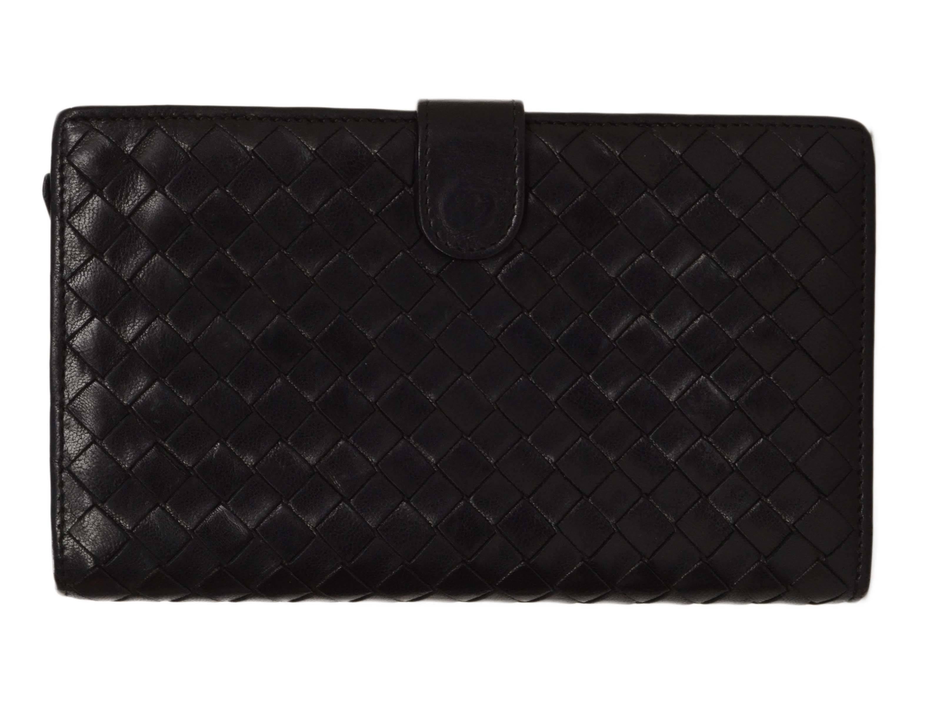 Bottega Veneta Black Woven Leather Continental Wallet

    Made In: Italy

    Color: Black

    Materials: Leather

    Lining: Leather

    Closure/Opening: Snap closure with zipper coin pocket

    Interior Pockets: Wallet features 8